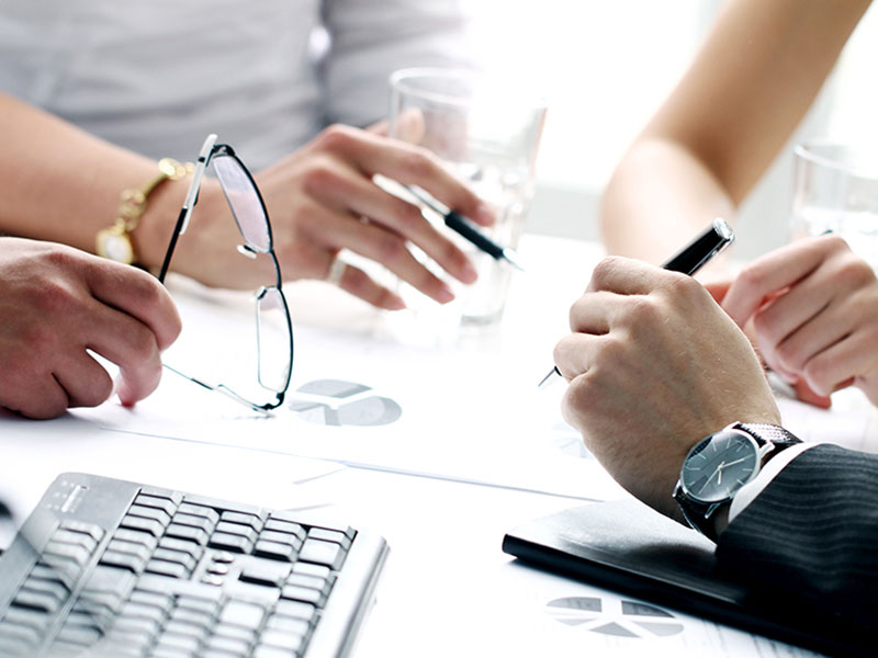 Hands At Meeting Table